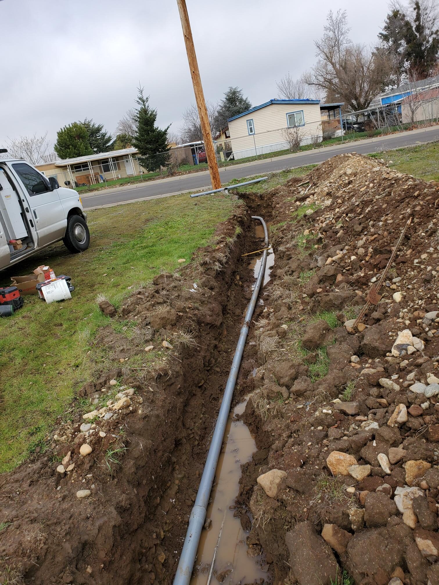 Electrical conduit installed in an open underground trench