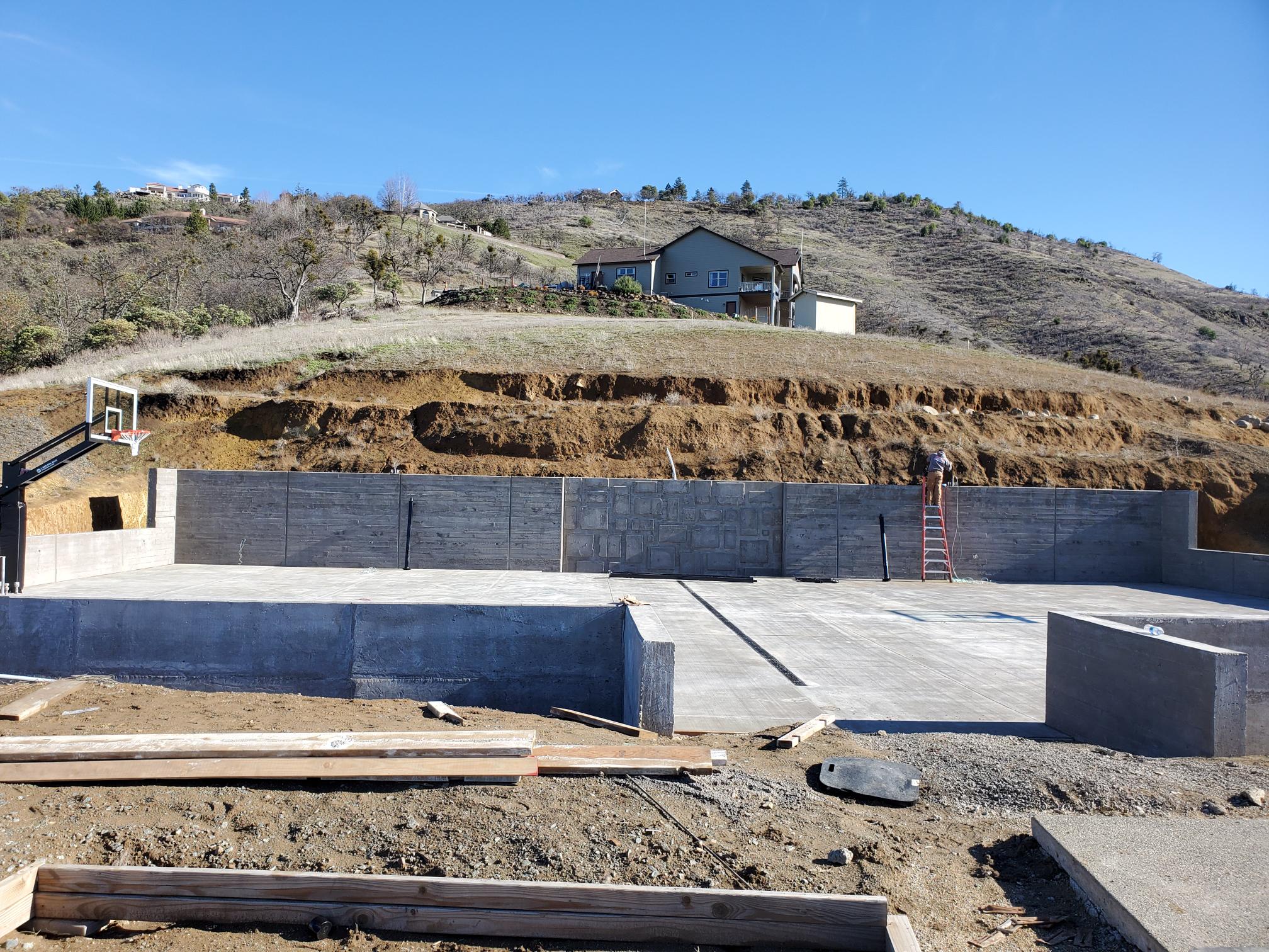 Hillside construction site prepared for electrical infrastructure
