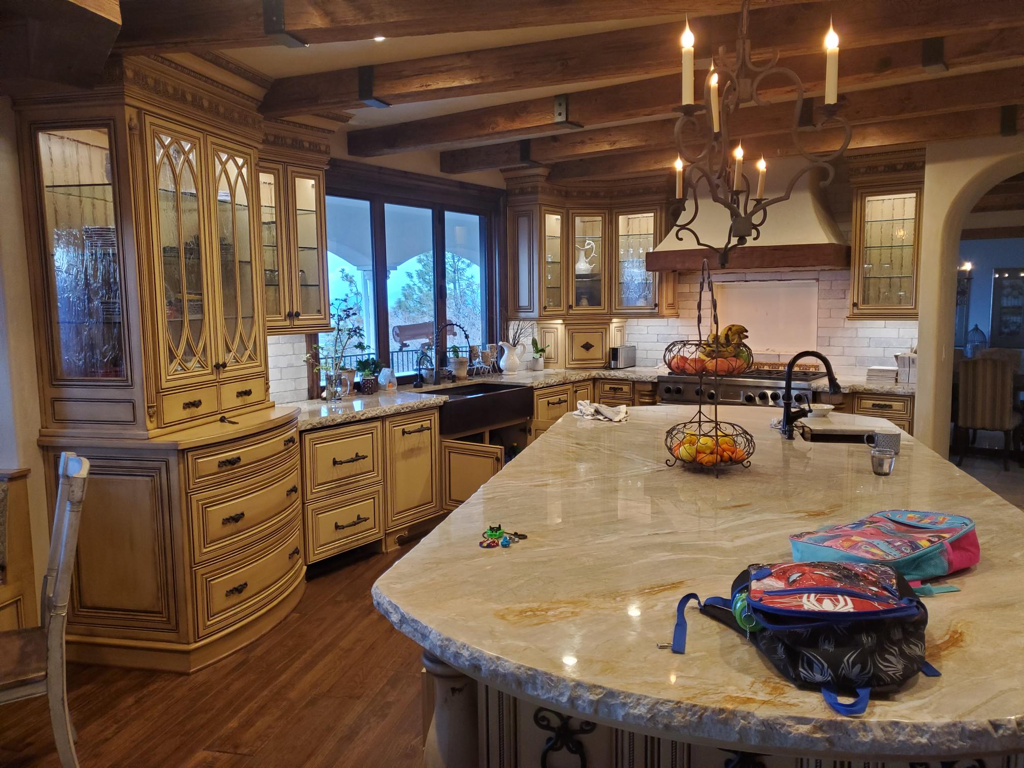 Finished Medford home kitchen with recessed and decorative electrical lighting