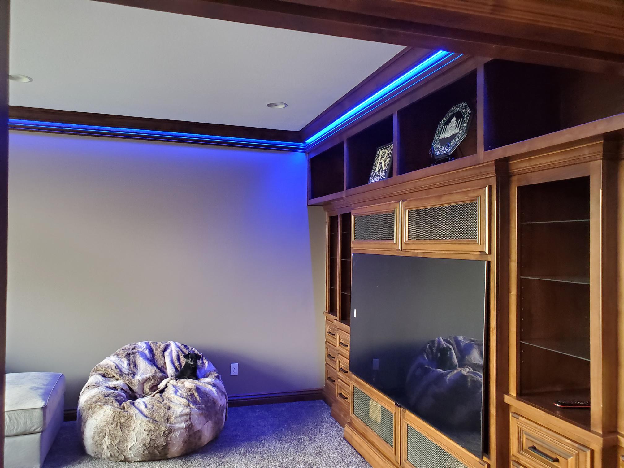 Blue LED accent lighting installed in a residential media room